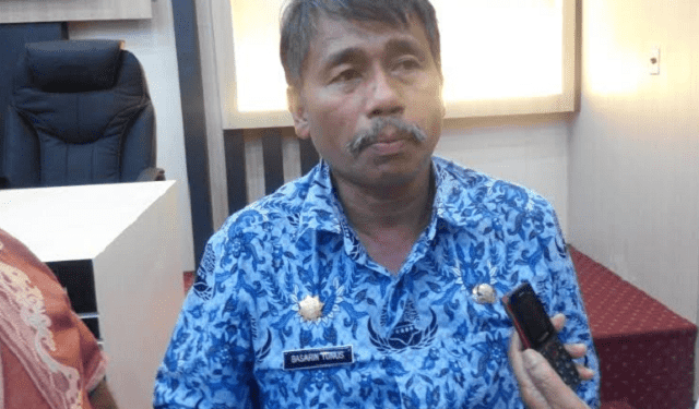 Drs Basarin Yunus Tanjung MSi