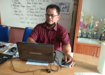 Sangkot Sitohang, S.Si, MP.d Kepala Sekolah SMK Teladan. P. Siantar