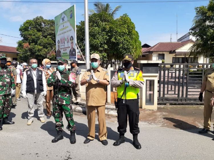 Walikota Tebingtinggi Bagikan Masker dan sosialisasi pengguna masker kepada masyarakat.